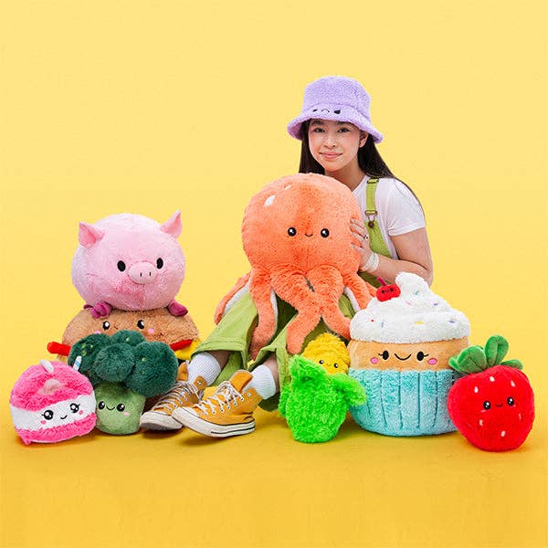 Assorted Mini Squishable plush characters in various colors arranged on a flat display.