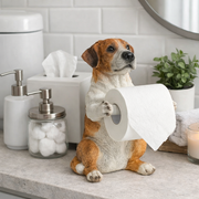 Dog toilet paper holder figurine holding a white paper roll